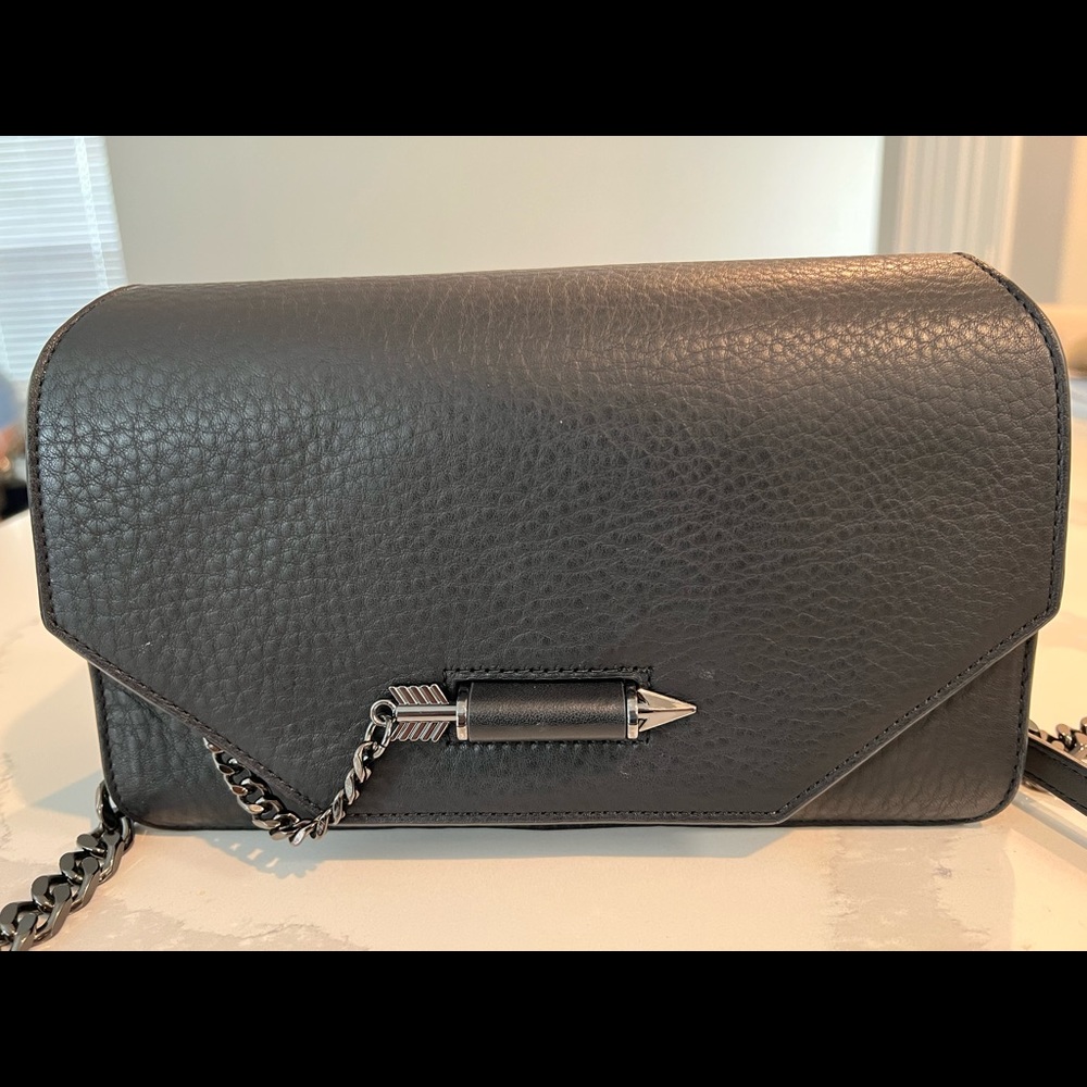 Black leather shoulder bag leather strap and gun metal chain strap